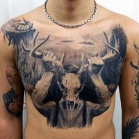 Realistic black ink chest tattoo of human with animal skull and horns