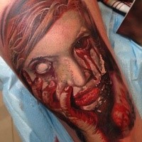 Realistic colored horror style bloody monster woman face tattoo