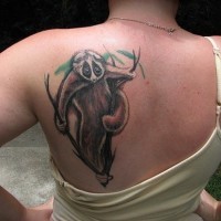 Realistic coloured sloth tattoo on back