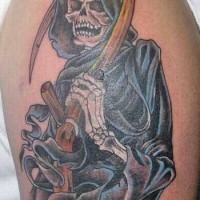 Realistic grim reaper tattoo on shoulder