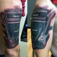 Realistic looking black and white music instruments tattoo on shoulder
