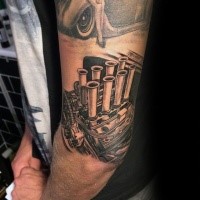 Realistic looking black and white shoulder tattoo of big engine