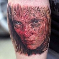 Realistic looking colored arm tattoo of famous actress face