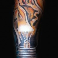 Realistic looking colored burning bulb tattoo on arm
