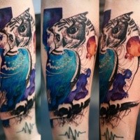 Realistic looking colored by Joanna Swirska arm tattoo of big owl