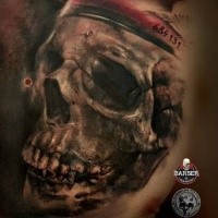 Realistic looking colored human skull with hat and number