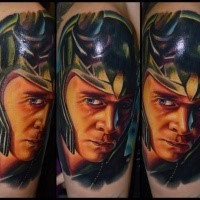 Realistic looking colored leg tattoo of Marvels superhero Loki