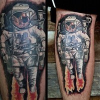 Realistic looking colored spaceman tattoo on leg