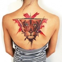 Realistic looking colored upper back tattoo of lion head with triangle