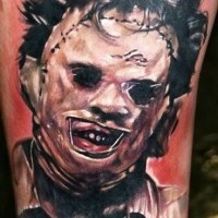 Realistic looking detailed horror movie hero tattoo on thigh