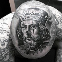 Realistic looking detailed medieval king clown tattoo on head