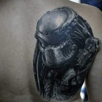 Realistic looking detailed scapular tattoo of evil Predator