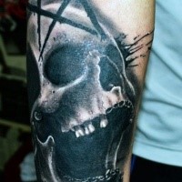 Realistic looking skull tattoo with devils star