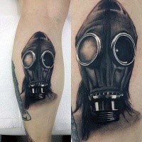 Realistic painted black and white leg tattoo of man in gas mask