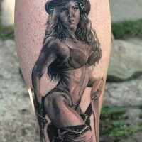 Realistic photo like black and white sexy firefighter woman tattoo on leg