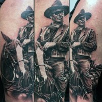 Realistic photo like colored western cowboy on horse arm tattoo