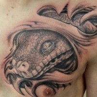 Realistic snake head skin rip tattoo on chest