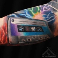 Realistic style colored forearm tattoo of type writer and lightning