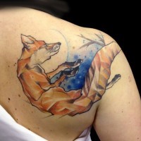 Red fox tattoo on shoulder blade