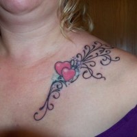 Red hearts with stars tattoo