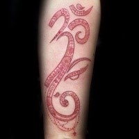 Red ink style big mystical symbol tattoo on forearm