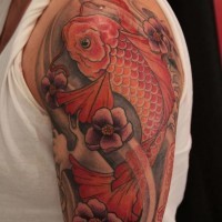 Red koi fish tattoo on half sleeve