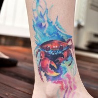 Red little crab tattoo in water