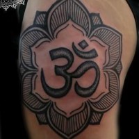 Religious hindu symbol tattoo on thigh