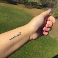 Religious tiny lettering Proverb 3:5 and heart wrist tattoo in black ink