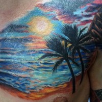 Romantic style colorful ocean sunset with palm trees tattoo on chest