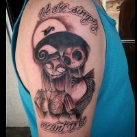 Romantic themed colored monster couple tattoo on shoulder with lettering