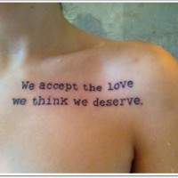 Romantic themed simple black ink lettering tattoo on shoulder