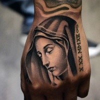 Sad Virgin Mary religious memorial tattoo on hand with Roman memorial date and infinity symbol