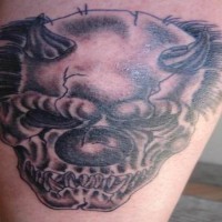 Scary skull clown with horns tattoo