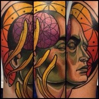 Science themed colored tattoo of human face wutg planet