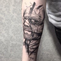 Scientific style black ink forearm tattoo of man in glasses portrait