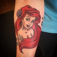 Seductive cartoon colored mermaid Ariel with sailors tattoos forearm tattoo with tiny pearls