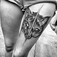 Separated black ink thigh tattoo of fox head by Inez Janiak