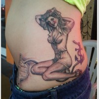 Sexy pin up girl in nurse costume and roped anchor realistic tattoo on waist