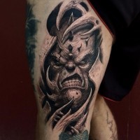 Sharp 3D style black and white thigh tattoo of demonic monster face