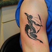 Sharp dark black ink Sagittarius special symbol shoulder tattoo in tribal style technique