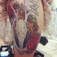 Sharp designed and painted half colored skull with flowers tattoo on thigh