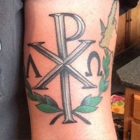Silver Chi Rho special Christ monogram symbol in Laurel wreath colored tattoo on forearm