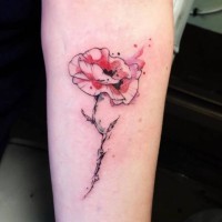 Simple abstract style half colored flower tattoo on forearm