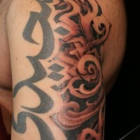 Simple big black ink Hinduism symbols tattoo on shoulder