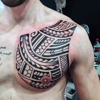 Simple black and white Polynesian style tattoo on chest