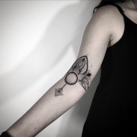 Simple black ink arm tattoo of mysterious ornament