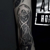 Simple black ink big jellyfish tattoo on arm