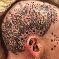 Simple black ink head tattoo of nice ornaments