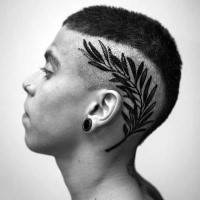 Simple black ink head tattoo of olive branch
